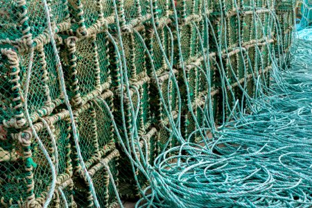 Stacks of lobster traps in Norra Grundsund 6 photo