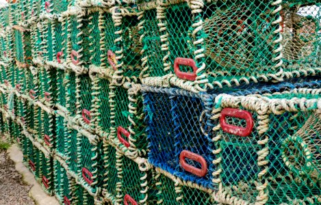 Stacks of lobster traps in Norra Grundsund 9 photo