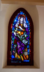 Stained glass window in the Galyatető Roman Catholic church with Saint Elisabeth