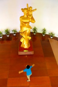 Statue and boy - Vietnamese Women's Museum - Hanoi, Vietnam - DSC04439