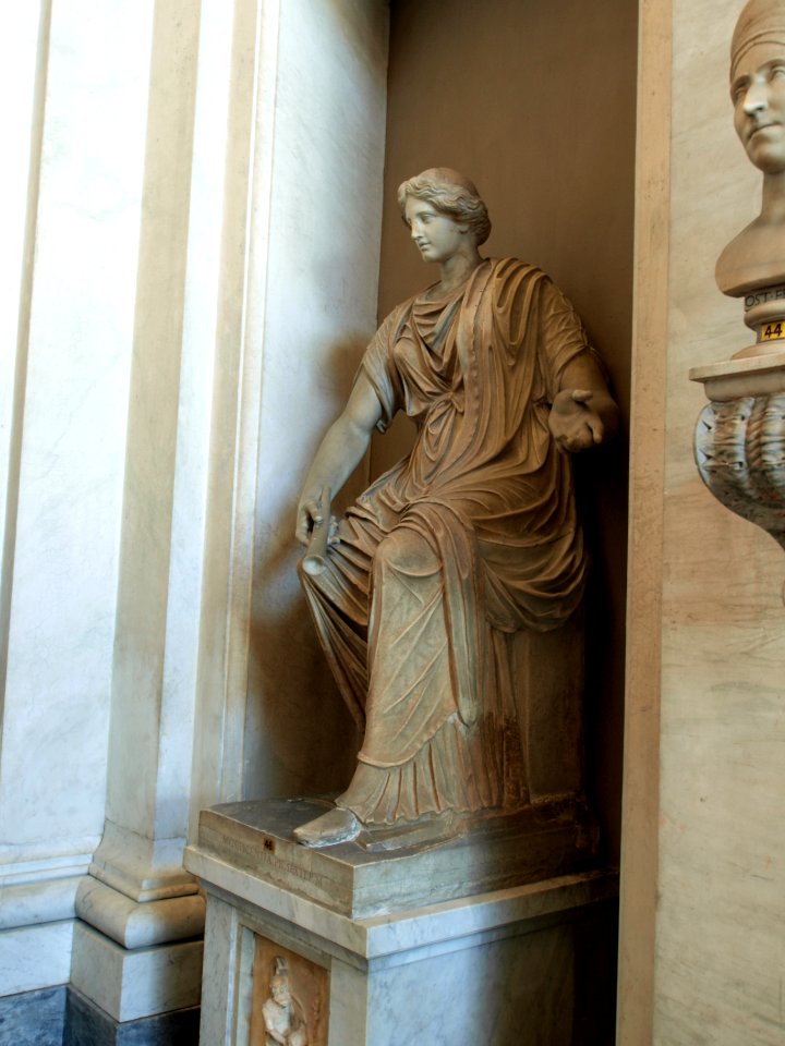 Statue of a female sitting in the Vatican museum