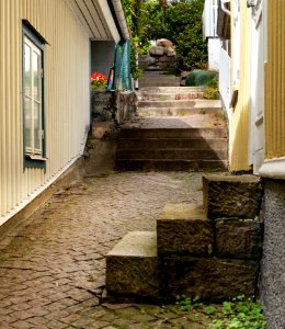 Steps and stairs in an alley at Gamla Strandgatan 36, Gamlestan, Lysekil