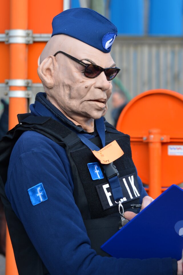 People dress up police officer