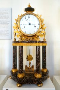 Table clock, late Gustavian, dial signed Israel Dahlstrom, Stockholm, c. 1800, Blyberg porphyry and burnished gilt bronze - Nordiska museet - Stockholm, Sweden - DSC00011