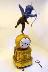 Table clock with Cupid, Empire style, dial signed Bourdier, Paris, early 1700s, gilt and dark-patinated bronze - Nordiska museet - Stockholm, Sweden - DSC09974