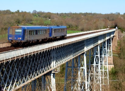 Ter 2252 train on railroad bridge build by EIffel