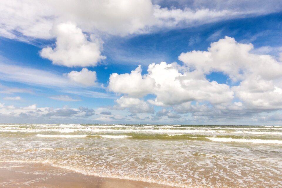 Beach clouds by the sea