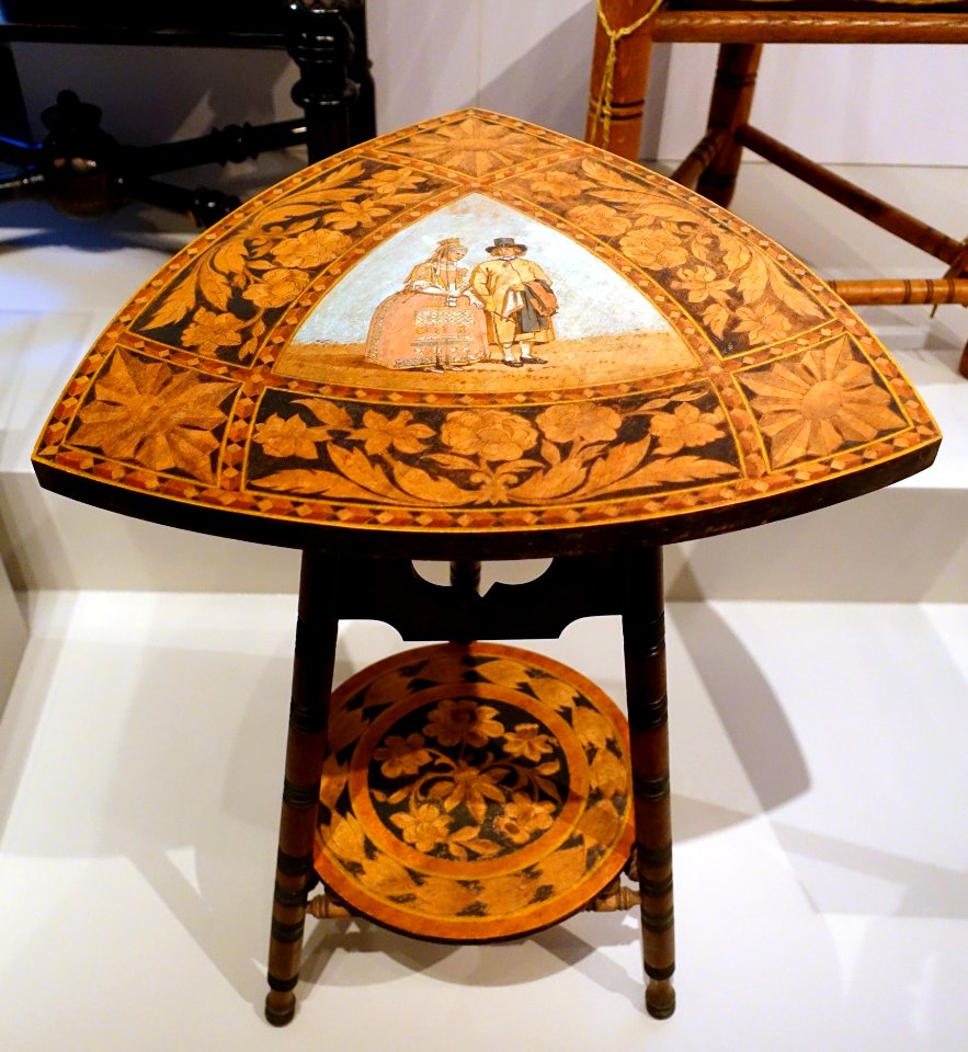 Table with bridal couple in folk costume from Vingaker, c. 1870, pokerwork and painted decoration - Nordiska museet - Stockholm, Sweden - DSC09824