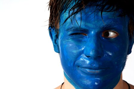 Person blue face painting