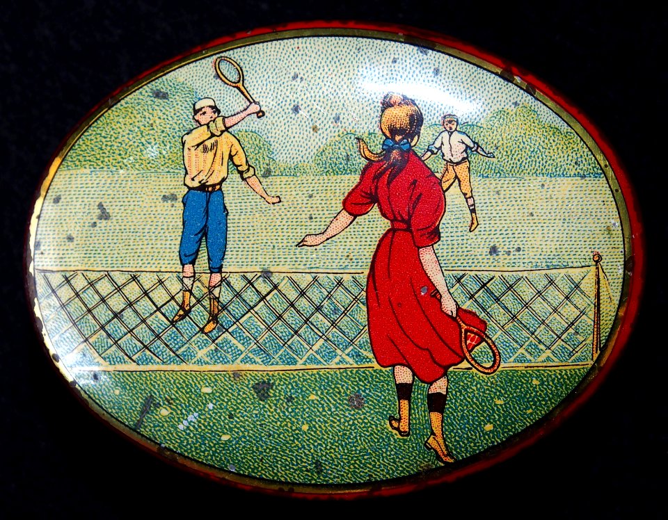 Sweets tin with picture of two people playing tennis