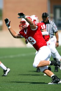 Defender defense rushing the passer photo