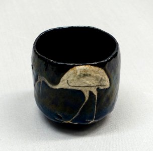 Tea bowl with crane and tortoise design, by Ninnami Dohachi, Raku ware, Kuroraku type, Japan, Edo period, 1800s AD, ceramic - Tokyo National Museum - Tokyo, Japan - DSC08967
