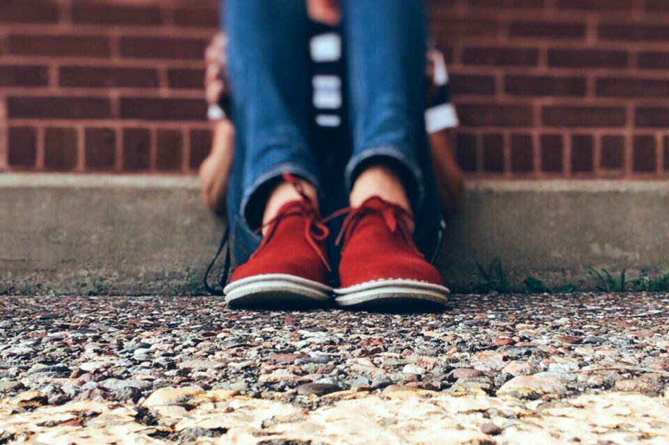 Bullied hiding alone
