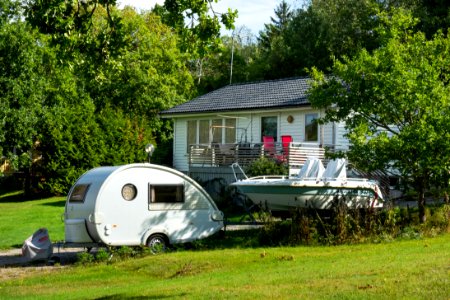 Teardrop camper trailer and boat in Barkedal