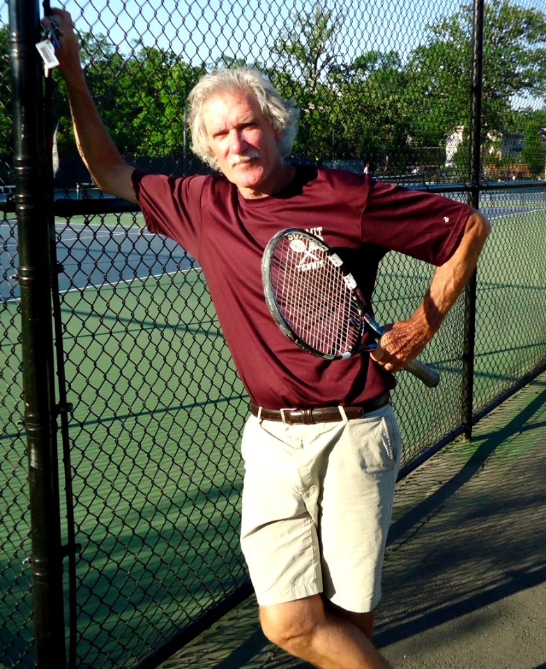 Tennis coach and social studies instructor Peter Tierney at Memorial Field courts