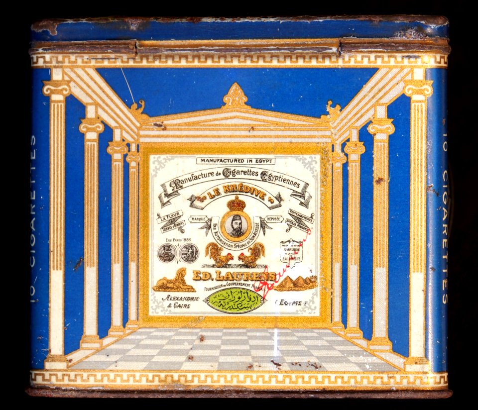 Tanagra cigarettes tin with side descriptions, back
