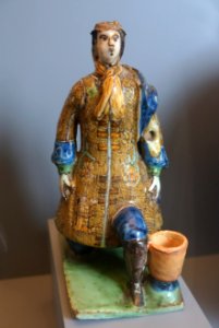 Talavera candlestick in the shape of kneeling knight, ceramic - Museo Nacional de Artes Decorativas - Madrid, Spain - DSC08116