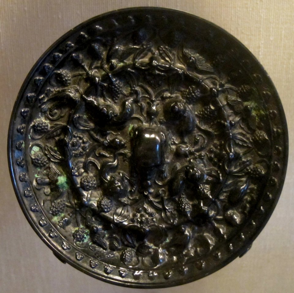 Tang dynasty bronze mirror with lions, birds and grapes design, HAA