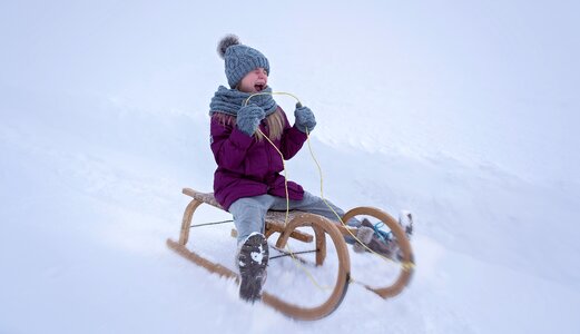 Girl slide toboggan photo