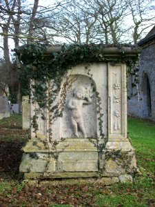 Tomb with weeping putto, Holywell, Cambs