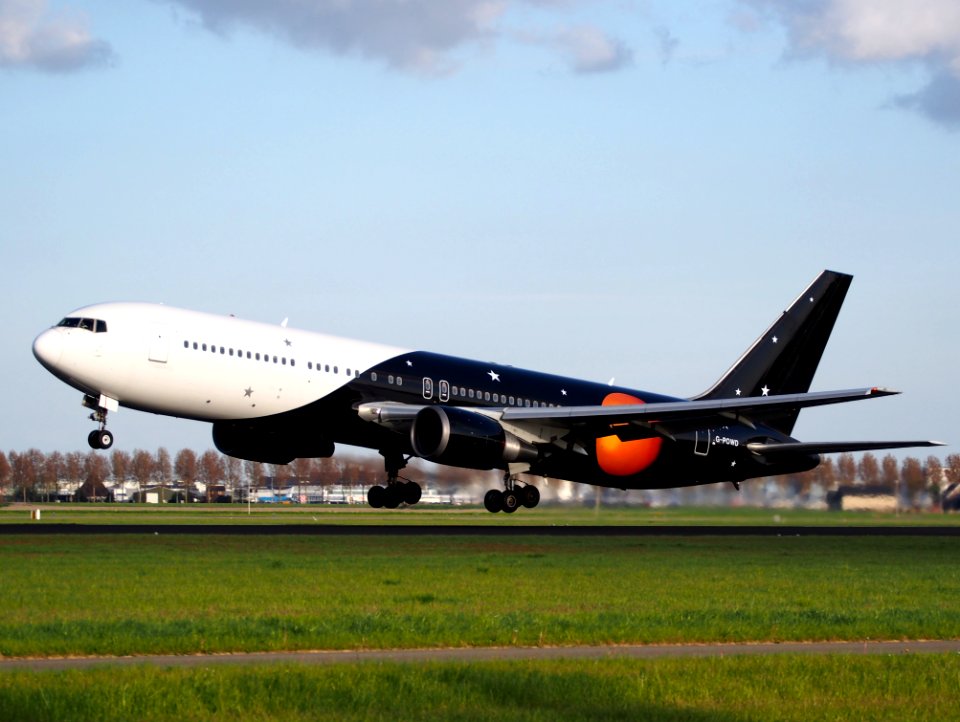 Titan Airways G-POWD Boeing 767 takeoff from Polderbaan, Schiphol (AMS - EHAM) at sunset, pic2