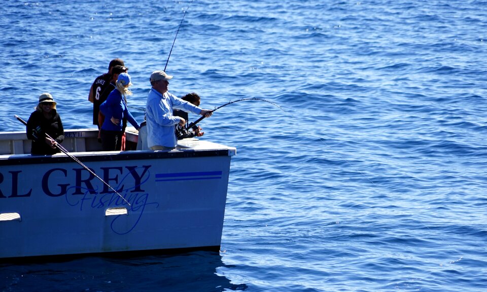 Angler fishing boat waters
