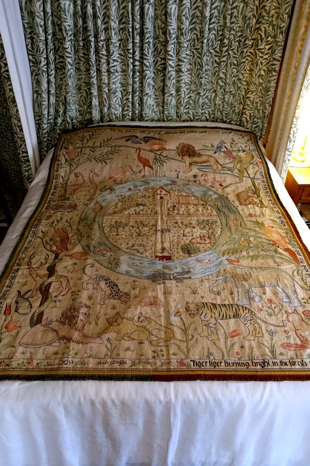 Tiger tiger burning bright, cot quilt designed by May Morris, embroidered by Jane Morris, c. 1900, silk on textile, view 1 - Kelmscott Manor - Oxfordshire, England - DSC00061