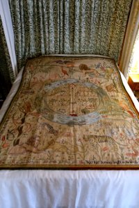 Tiger tiger burning bright, cot quilt designed by May Morris, embroidered by Jane Morris, c. 1900, silk on textile, view 1 - Kelmscott Manor - Oxfordshire, England - DSC00061