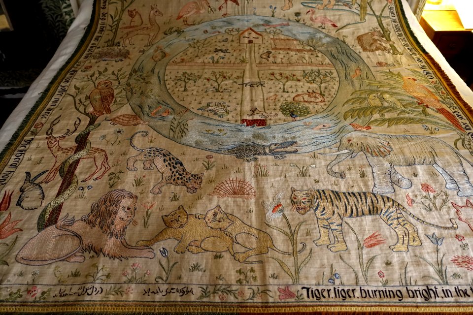 Tiger tiger burning bright, cot quilt designed by May Morris, embroidered by Jane Morris, c. 1900, silk on textile, view 2 - Kelmscott Manor - Oxfordshire, England - DSC00064