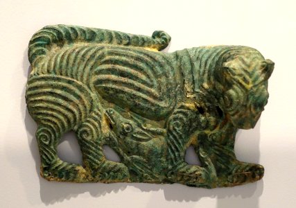 Tiger Walking over a Deer or Gazel, 1 of 2, openwork plaque from a horse's harness, Eastern Eurasian or China, Zhou dynasty, 6th-5th cent. BC, bronze - Arthur M. Sackler Museum, Harvard University - DSC01566