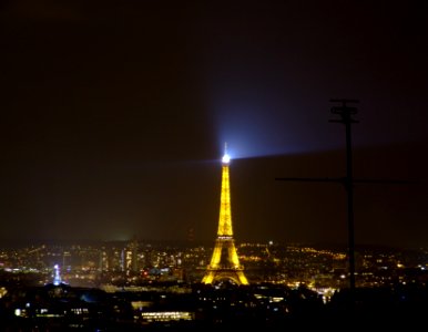 Tour Eiffel at night, seen from Mont Martre photo