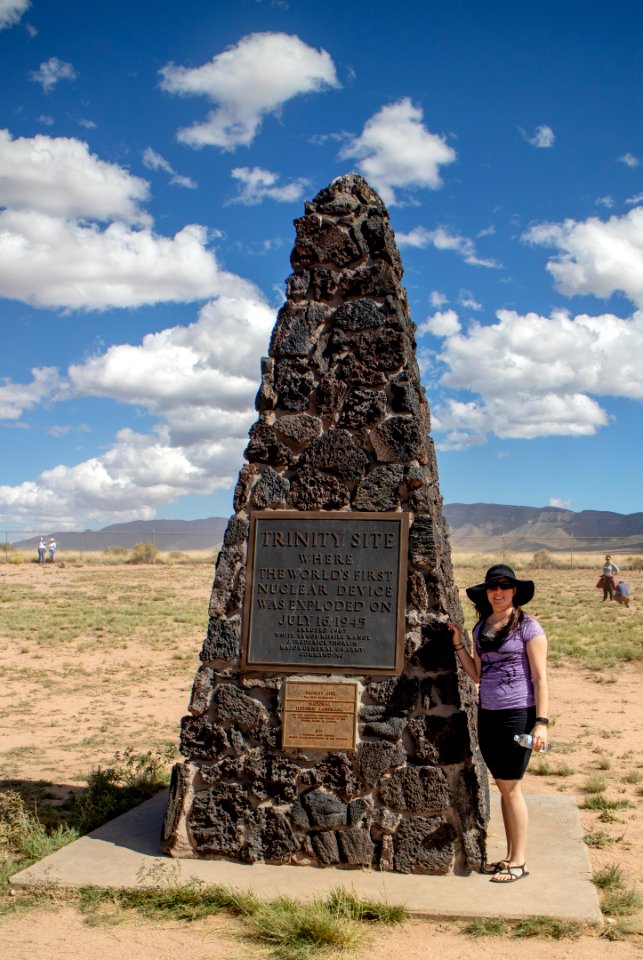 Tourist Standing Next to Trinity Site Monument or Obelisk
