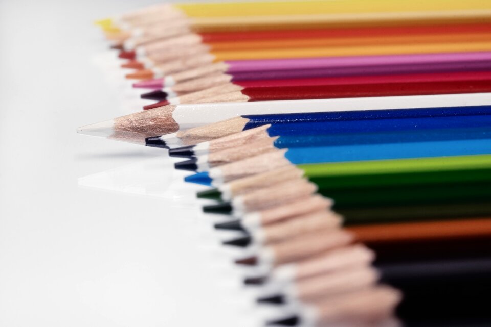Pens different colored crayons colorful wooden pegs