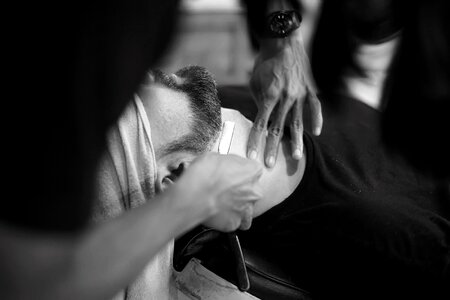 Shaving black and white man photo