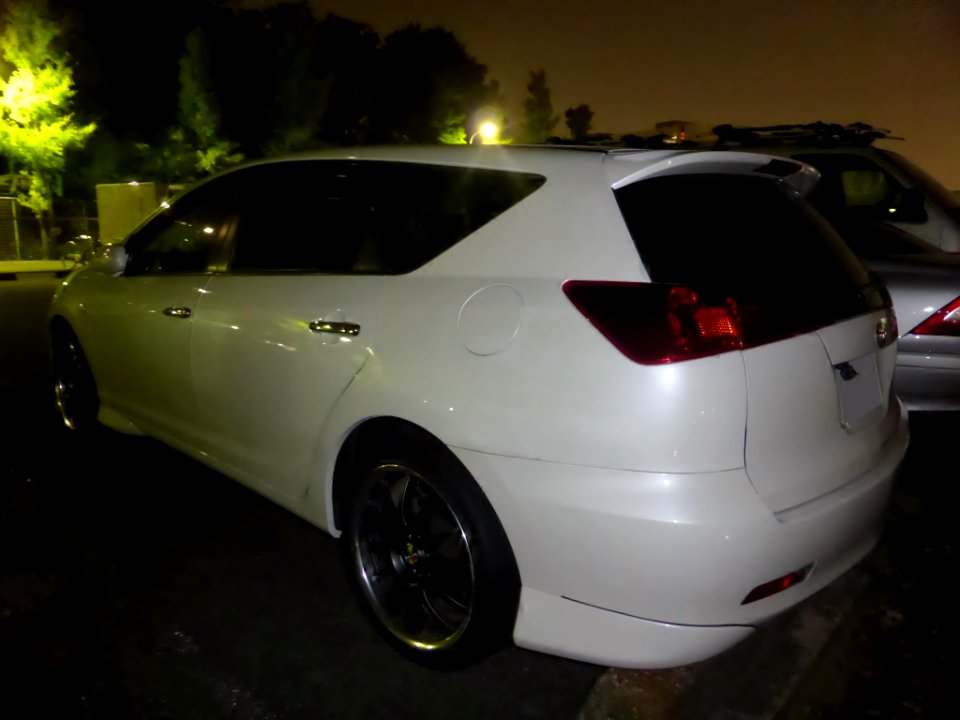 Toyota CALDINA (T240W) at night rear