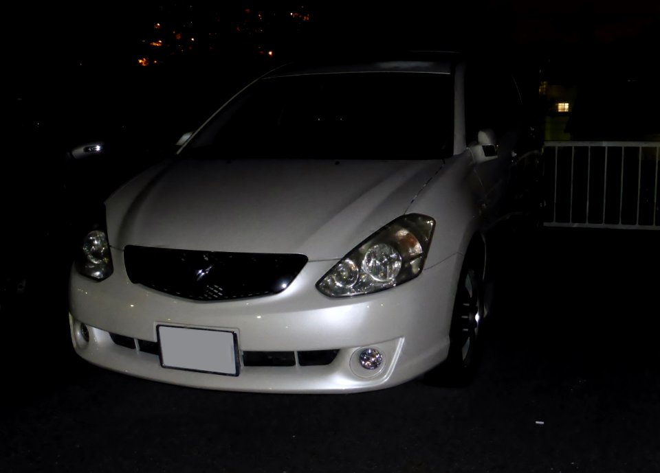 Toyota CALDINA (T240W) at night front