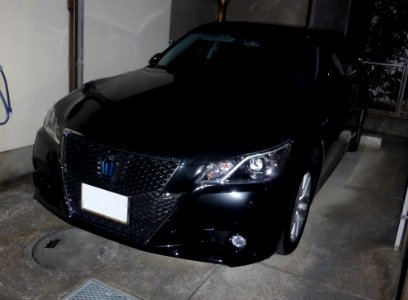 Toyota CROWN HYBRID ATHLETE (S210) at night front