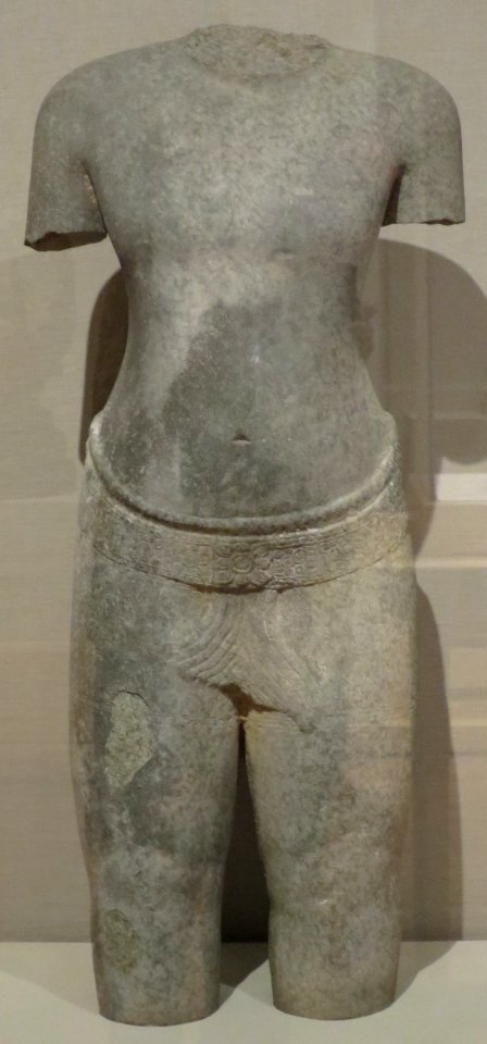 Torso from Cambodia or Thailand, Angkor kingdom, Bayon style, 12th-13th century, sandstone, HAA