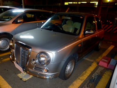 The frontview of Nissan MARCH Bolero 3door (K11) at night