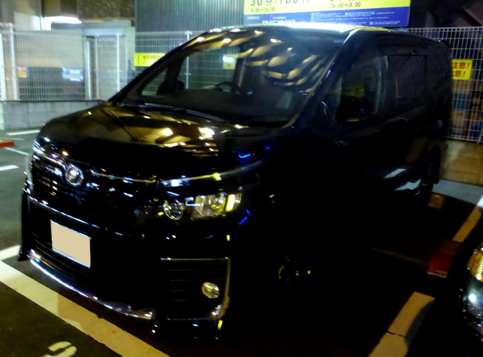 The frontview of Toyota VOXY ZS (R80W) at night