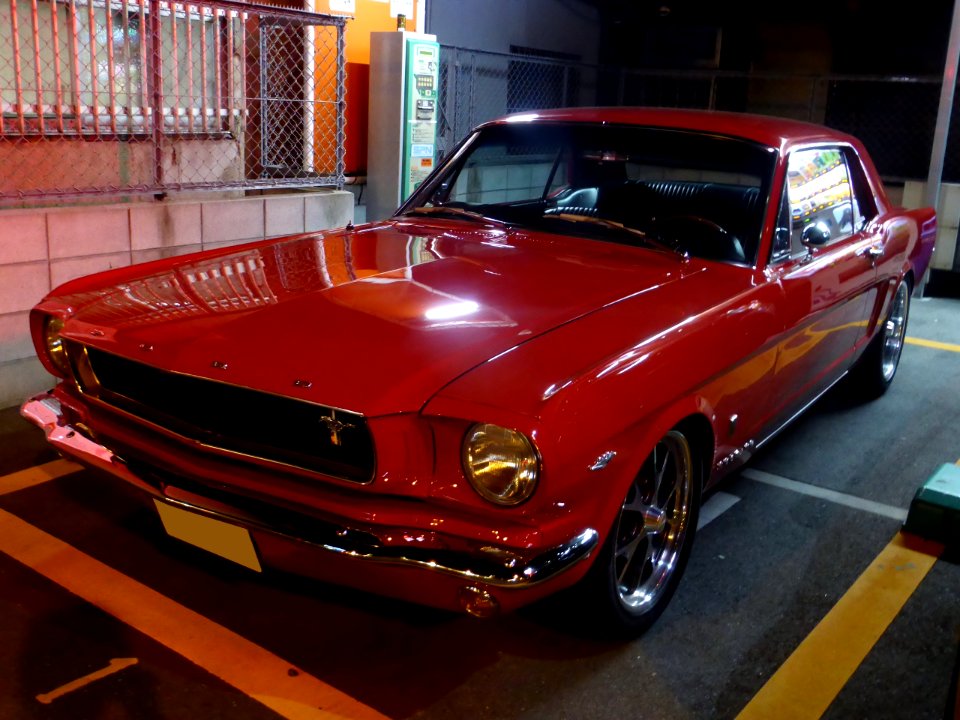 The frontview of Ford Mustang MY1965 at night
