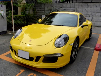 The frontview of yellow Porsche 991 Carrera S
