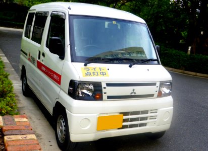 The frontview of Mitsubishi MINICAB VAN (U61V) of MITSUBISHI ELECTRIC BUILDING TECHNO-SERVICE CO., LTD. Kansai Branch