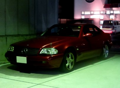 The frontview of Mercedes-Benz SL500 (R129) at night