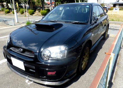 The frontview of black Subaru IMPREZA WRX STi (GDB)