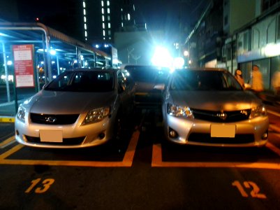 The frontview of Toyota COROLLA FIELDER (E140&E160) at night