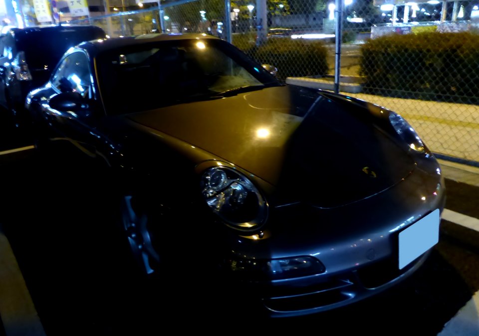 The frontview of Porsche 997 Carrera at night