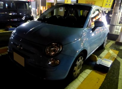 The frontview of 3rd generation FIAT 500 TwinAir Pop at night