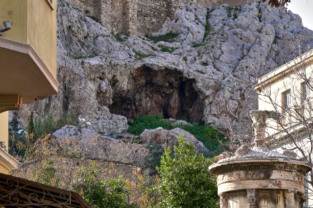 The "Sanctuary of Aglaurus" Cave on the East Slope of the Acropolis from Lysicrates Street on March 11, 2020 photo