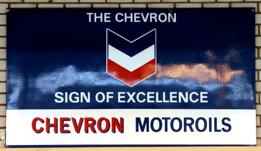 The Chevron sign of excellence, Chevron Motoroils, enamel advertising sign